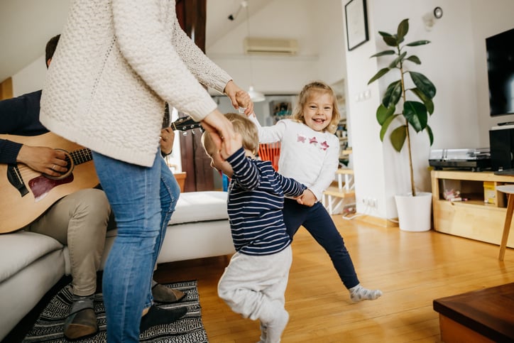 family-dancing-playing-guitar