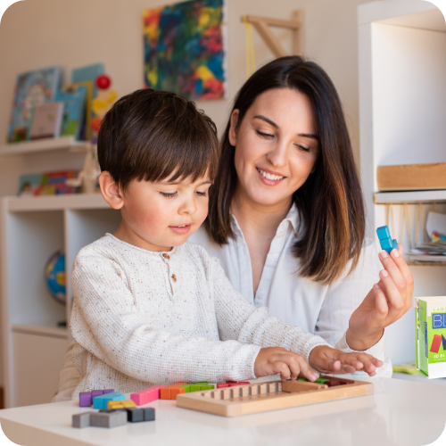 Teacher and Child with blocks