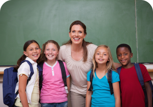 happy teacher with kids